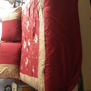 Three pieces of full comforter.